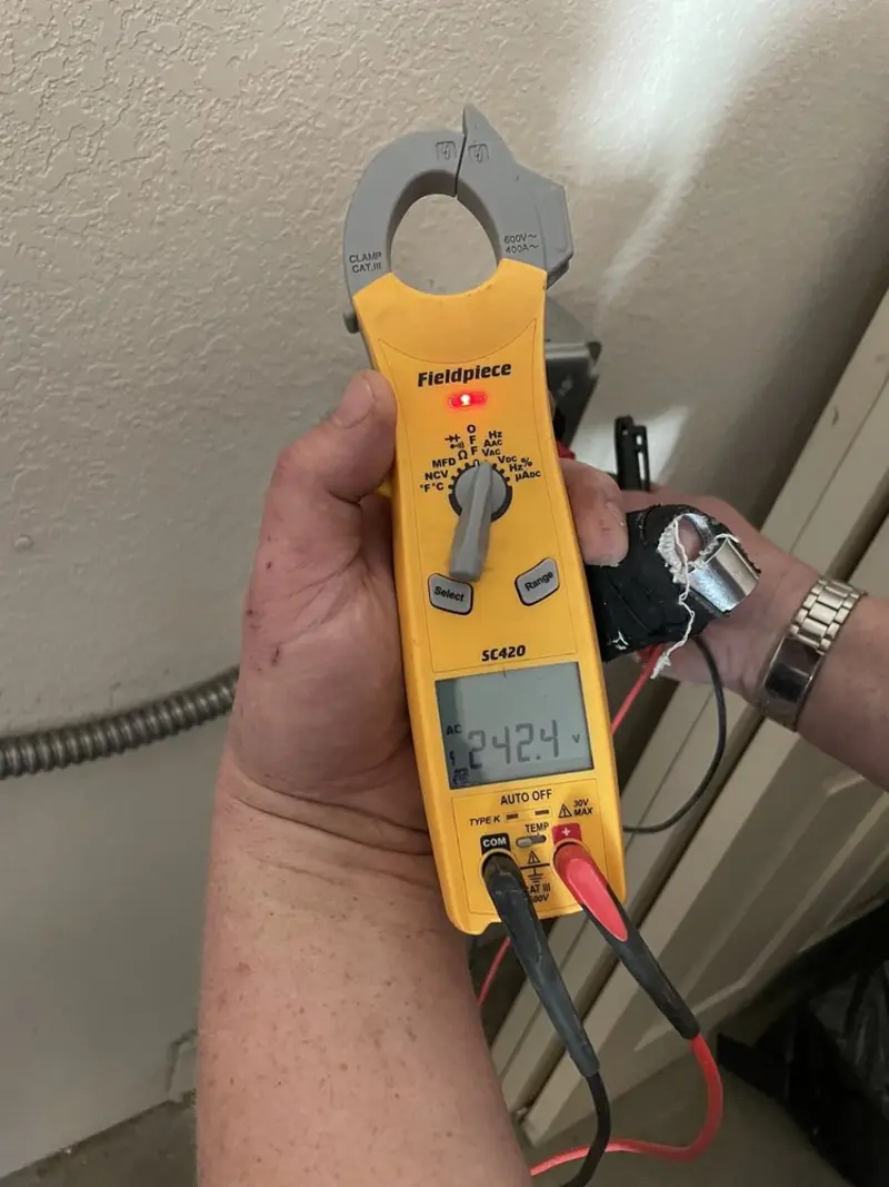 Voltage testing with clamp meter during Generator Installation in Mobile